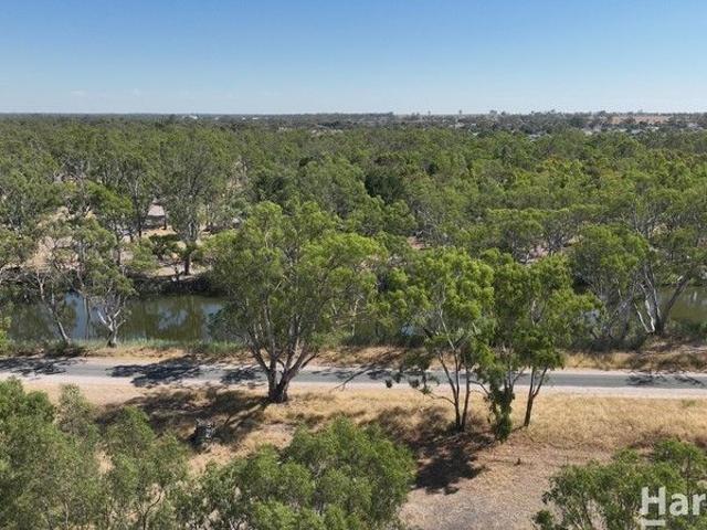 River Adjacent Land Offering Privacy and Character