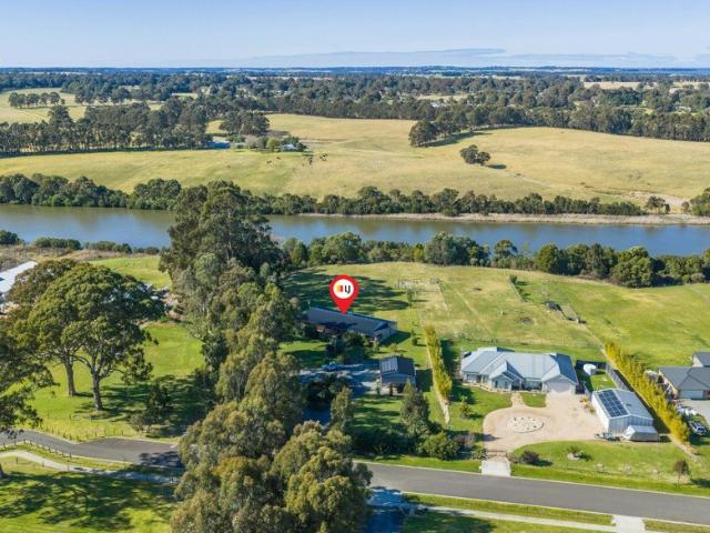 RIVERFRONT COUNTRY LIVING IN THE SOUGHT AFTER RIVER BEND ESTATE