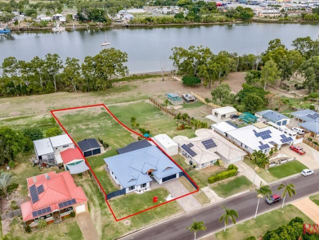 Riverfront Elegance on 2,113m² Spacious Family Living with Stunning Burnett River Views