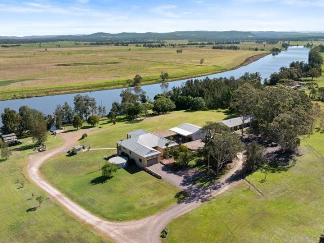 Riverfront luxury, two homes, where generations come together