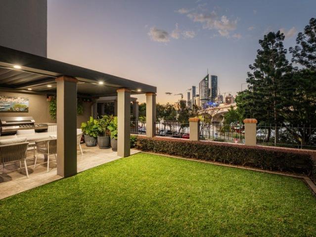 Riverfront Luxury with an Expansive Private Garden Terrace