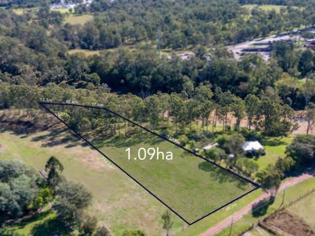 RIVERFRONT LAND. LIVESTOCK POTENTIAL. STORAGE & LIFESTYLE OPPORTUNITY