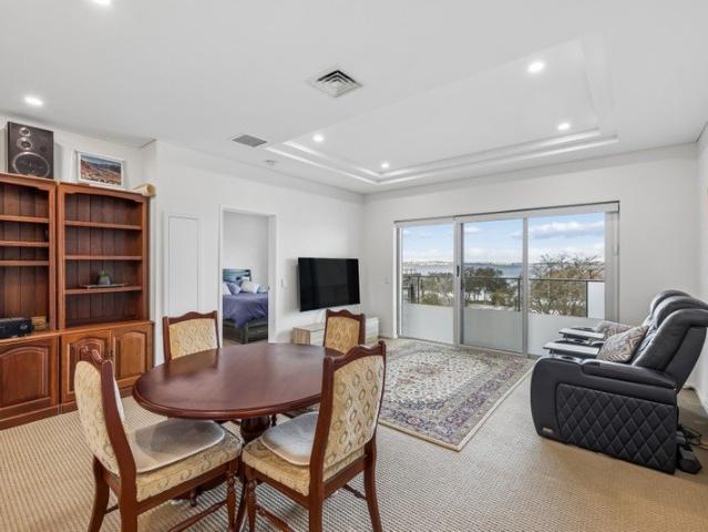 RIVERFRONT LIVING WITH PANORAMIC VIEWS & A FLEXIBLE HOME OFFICE