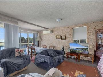 Riverfront Living with Stunning Macleay Views with 2 Bedrooms and 1 Bathroom