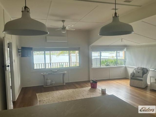 RIVERFRONT LIVING WITH STUNNING VIEWS