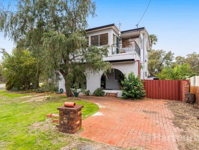 Riverfront Living with Space, Character and Endless Potential