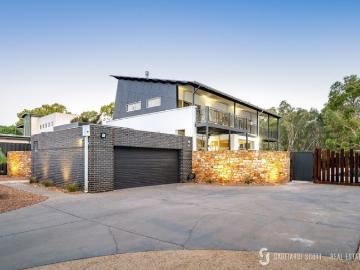 Riverside Grandeur Meets Contemporary Sophistication