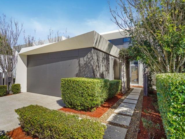 Riverside Living Within the Prestigious Royal Pines Estate