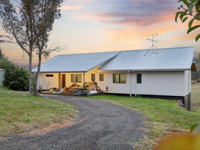 Riverside Serenity with Spectacular Mountain Views