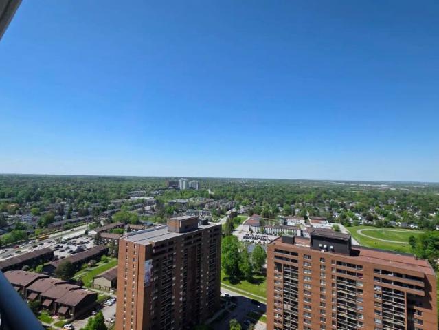 Riviera Suites — 1 Bedroom + Den