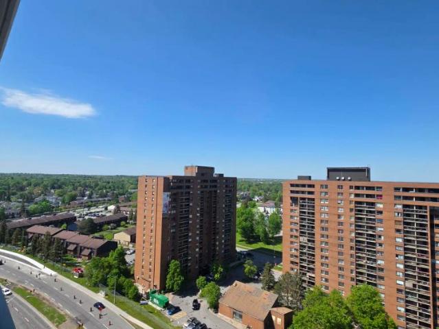 Riviera Suites — 1 Bedroom + Den