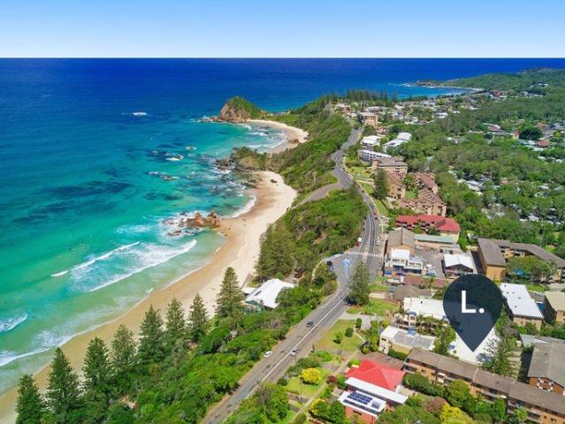 ROOFTOP BBQ, OCEAN VIEWS AND FLYNNS BEACH AT YOUR DOOR