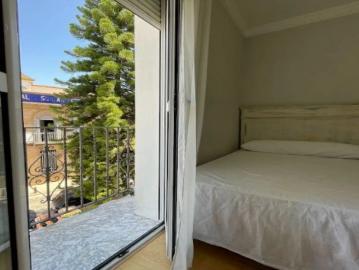 Room in a shared 12 bedroom apartment for rent in El Porvenir