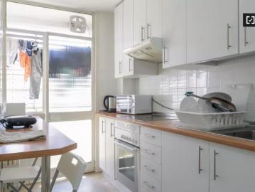 Room in a shared 8 bedroom apartment for rent in Cuatro Caminos
