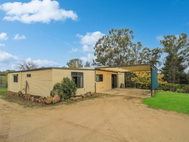 ROOM TO MOVE ON 3.3 ACRES AND SO CLOSE TO TOWN!