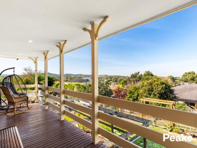 Room To Grow: Expansive Home With Views & Side Access