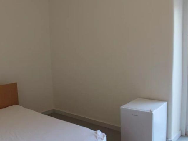 Room with a private terrace for rent in a residence in Celas, Coimbra