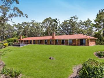 ROCKY LODGE Secluded acreage with dual residences and stunning views