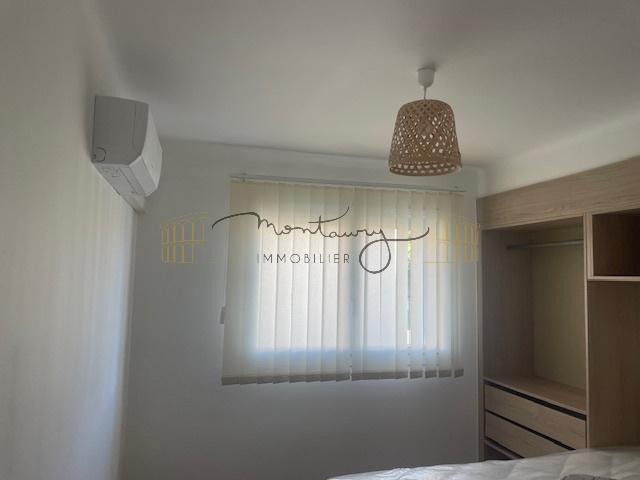 RODILHAN – APPARTEMENT P2 MEUBLÉ AVEC COUR PRIVATIVE, GARAGE ET STATIONNEMENT