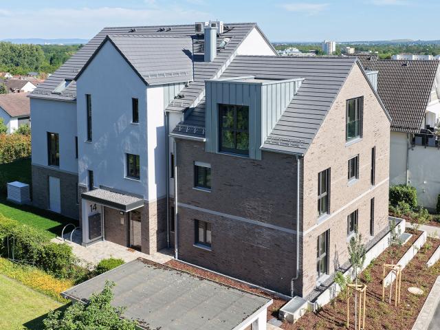 Rohbau fertig: Wohnen über der City – 3 Zi. im DG in FFM Bergen Enkheim