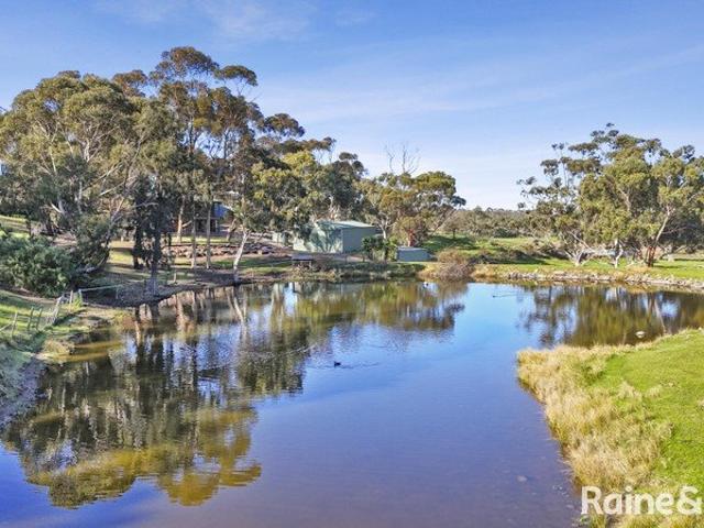 Rolling Hills, Expansive Dam & Rural Charm