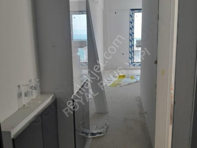 Royal Plustan Hacıömerlide Satılık Deniz Manzaralı 1+1 Daire