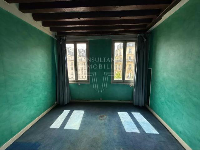 RUE DE L'ÉCHAUDÉ / STUDIO EN ÉTAGE ÉLEVÉ
