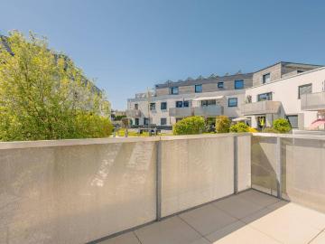 RUHE. SONNE. WALLERSEE. 2 Zimmer Wohnung mit sonnigem Balkon und Tiefgarage