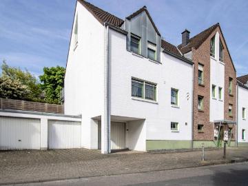 Ruhig wohnen, bestens angebunden 3 Zimmer Erdgeschosswohnung mit Garten und Garage