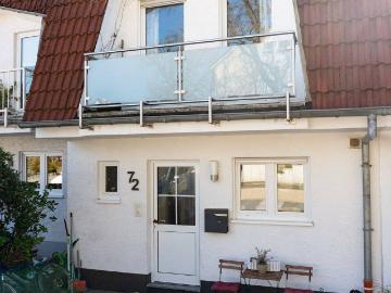 Ruhig wohnen, zentral leben: Reihenmittelhaus mit Südgarten und Weitblick ins Grüne!