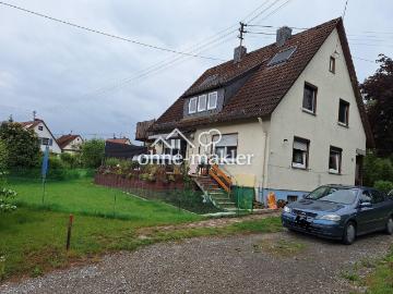 Ruhig gelegenes Einfamilien / Zweifamilienwohnhaus mit sonnigem Garten