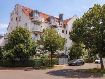 Etagenwohnung kaufen in Oberholz, Großpösna - Garten