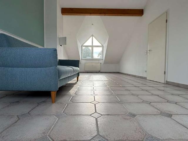 Ruhige Dachgeschosswohnung mit Balkon und TG Stellplatz – ideal zur Eigennutzung oder Kapitalanlage