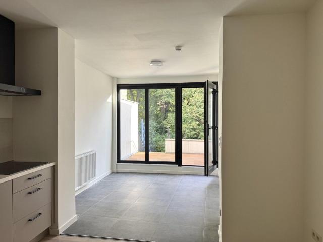 Ruim duplex appartement met 4 slaapkamers en ruime tuin
