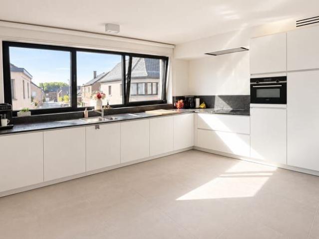 Ruim duplexappartement met autostaanplaats en tuin