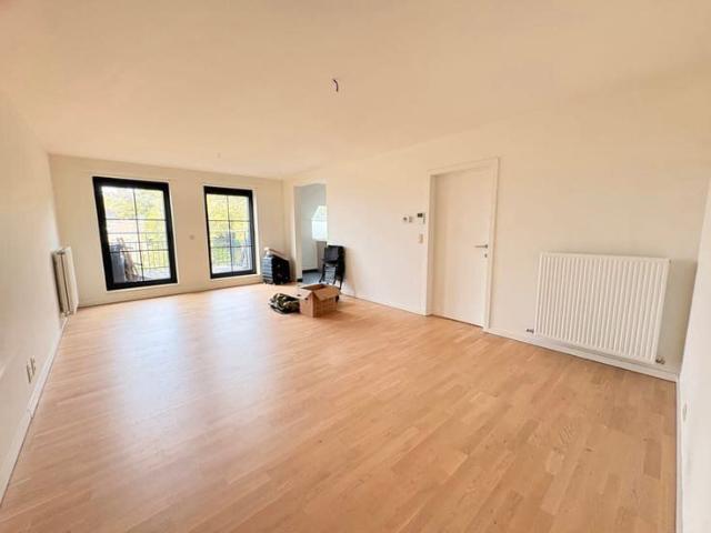 Ruim en licht appartement met terras en garagebox
