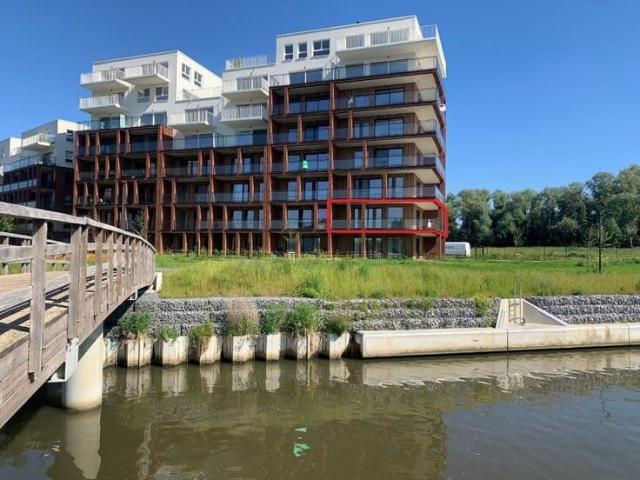 Ruim hoekappartement met fenomenaal Leiezicht en 40 m² zonne