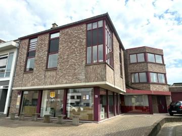Ruim tweeslaapkamerappartement in het hartje van Liedekerke!