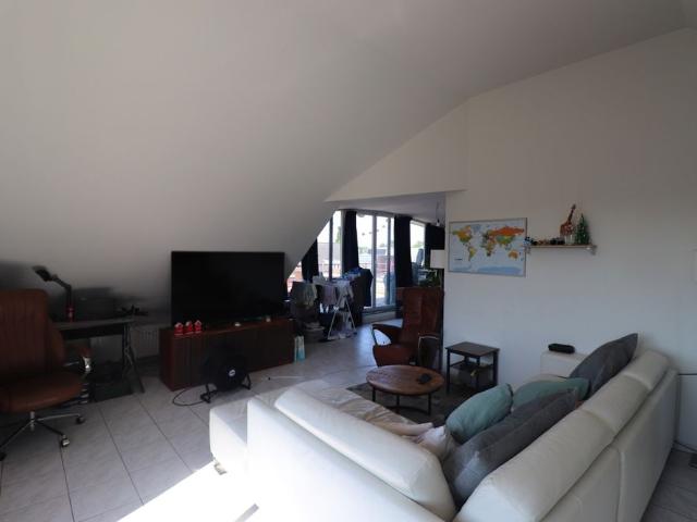 Ruim 1 slaapkamerappartement 121m² met lift, terras, garage en autostaanplaats