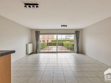 Ruim 2 slpkappartement gelijkvloers met tuin en garage