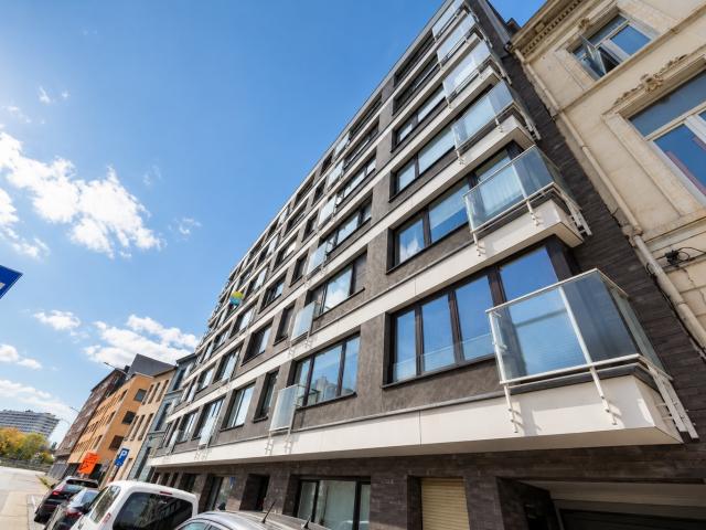 Ruim 3 slaapkamerappartement met garagebox