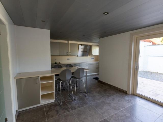 Ruime woning met 4 slaapkamers, garage en tuin