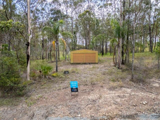 BARGAIN BUY: Just over 4 acres of Land with a steel shed on an A1 Concrete slab Investor or Dream home