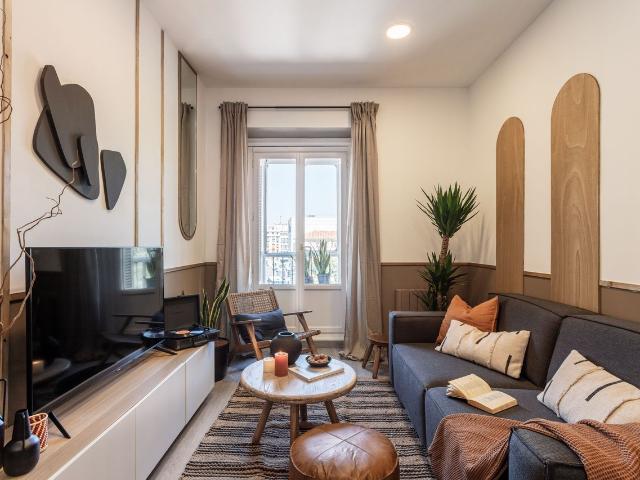 Rustic 2 Bedroom Flat with Desert Inspired Design and Private Office in Justicia, Madrid Amsterdam Apartments for Rent