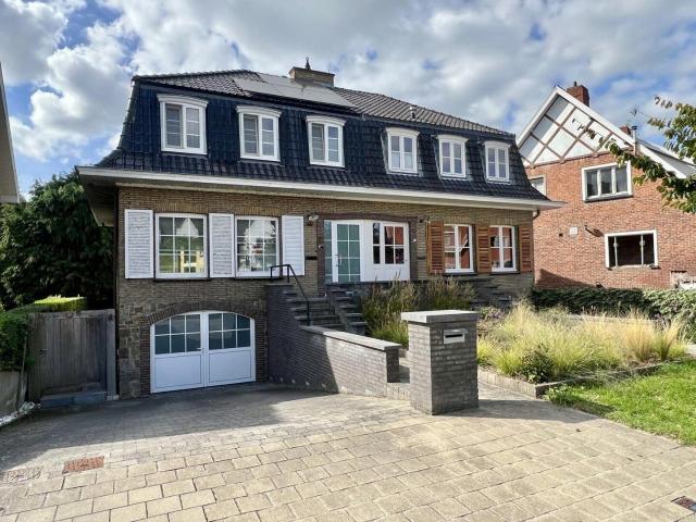 Rustig gelegen woning met 3 slaapkamers, garage en tuin in S