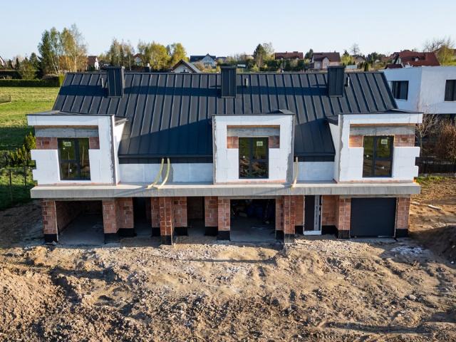 Do sprzedania dom szeregowy 117,49 m² z garażem i ogrodem