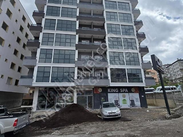 Sıfır Bina Geniş Balkonlu Cadde Üzeri Satılık 1+1