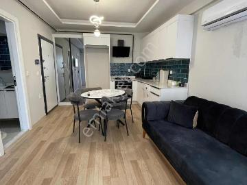 Sıfır~bulvar~üzeri~ultra~lüks~site~özel~güvenlikli~1+1~eşyalı