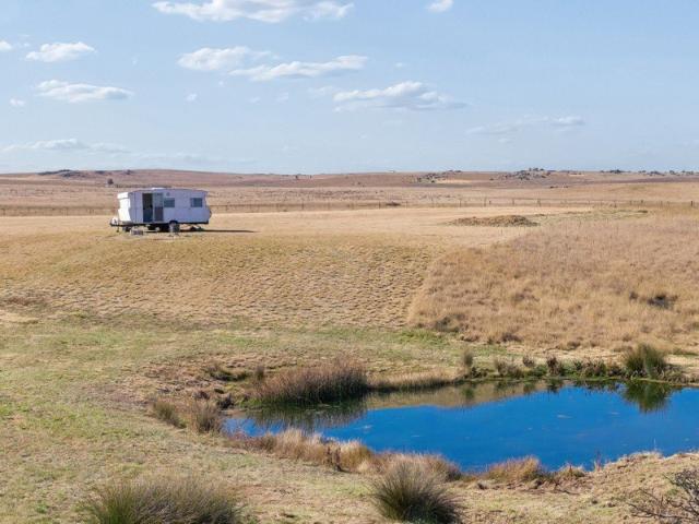 Scenic Acreage with Snowy Mountains & River Views