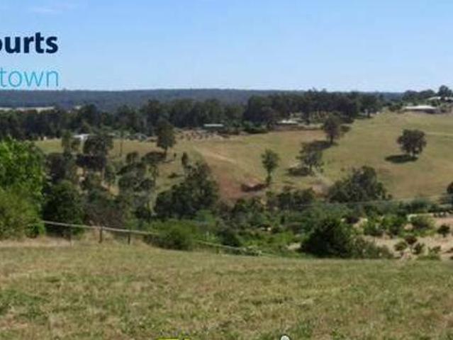 Scenically supreme land overlooking picturesque wooded countryside farmlands